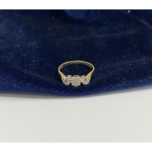 129 - A STUNNING IRISH 18CT YELLOW GOLD THREE STONE DIAMOND RING, with central round brilliant cut diamond... 