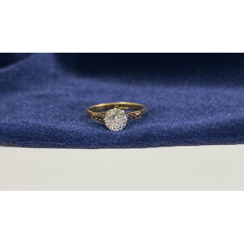 144 - A REALLY BEAUTIFUL 18CT YELLOW GOLD SOLITAIRE RING, with central round cut clear gemstone, in raised... 