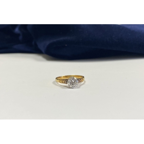 144 - A REALLY BEAUTIFUL 18CT YELLOW GOLD SOLITAIRE RING, with central round cut clear gemstone, in raised... 