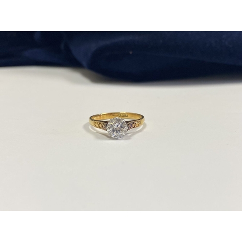 144 - A REALLY BEAUTIFUL 18CT YELLOW GOLD SOLITAIRE RING, with central round cut clear gemstone, in raised... 