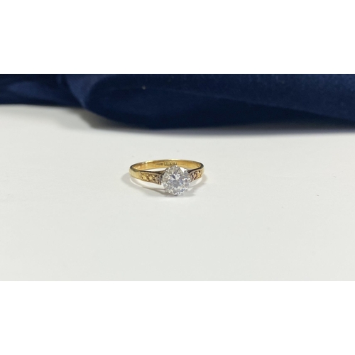 144 - A REALLY BEAUTIFUL 18CT YELLOW GOLD SOLITAIRE RING, with central round cut clear gemstone, in raised... 