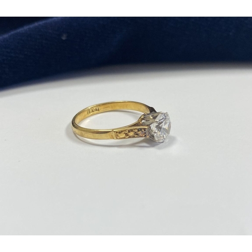 144 - A REALLY BEAUTIFUL 18CT YELLOW GOLD SOLITAIRE RING, with central round cut clear gemstone, in raised... 