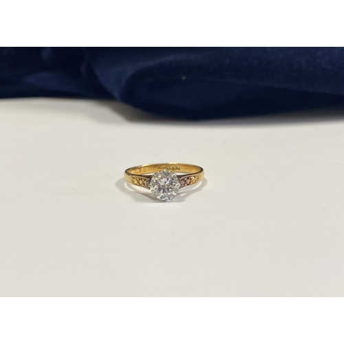 144 - A REALLY BEAUTIFUL 18CT YELLOW GOLD SOLITAIRE RING, with central round cut clear gemstone, in raised... 