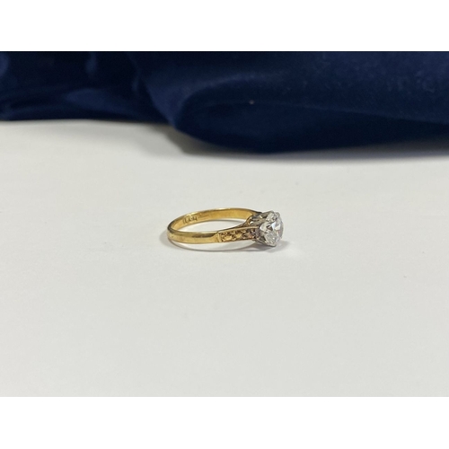 144 - A REALLY BEAUTIFUL 18CT YELLOW GOLD SOLITAIRE RING, with central round cut clear gemstone, in raised... 