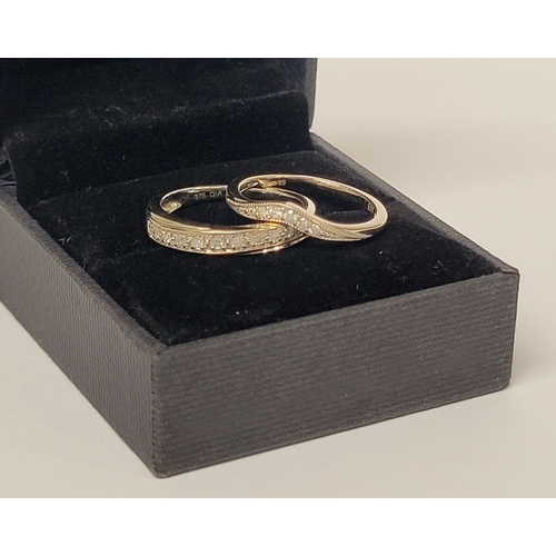 156 - A BEAUTIFUL 9CT GOLD DIAMOND ENCRUSTED STACKING SET, with a cross over setting to the band with a ro... 