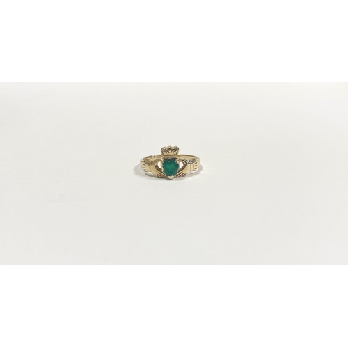 158 - A 10CT YELLOW GOLD GEMSET CLADDAGH RING, the green gemstone set to the centre in a heart shape. Ring... 