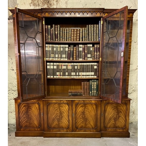 169 - A BEAUTIFUL MAHOGANY BREAKFRONT ASTRAGAL GLAZED LIBRARY BOOKCASE, to the top a dentil decorated pedi... 