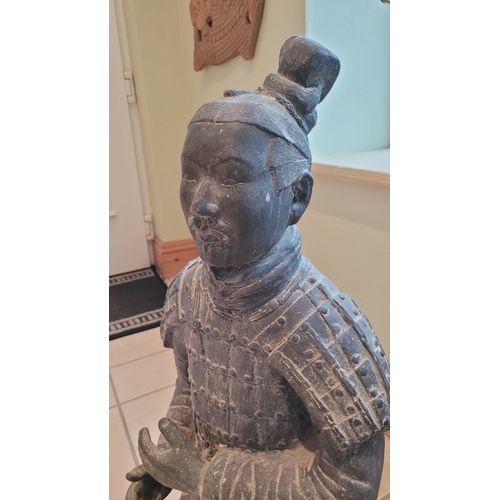 173 - A TERRACOTTA WARRIOR DECORATIVE ORNAMENTAL STATUE, in a knelling position. Dimensions: 67.5 x 32 x 2... 