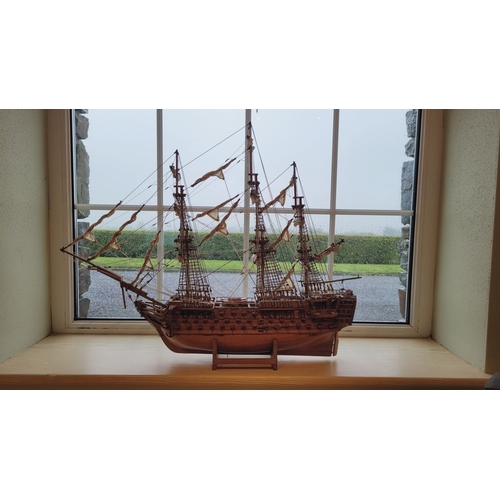 176 - A LARGE HANDMADE MODEL OF THE HMS VICTORY, made by a firm of model makers in Mauritius, Dimensions: ... 