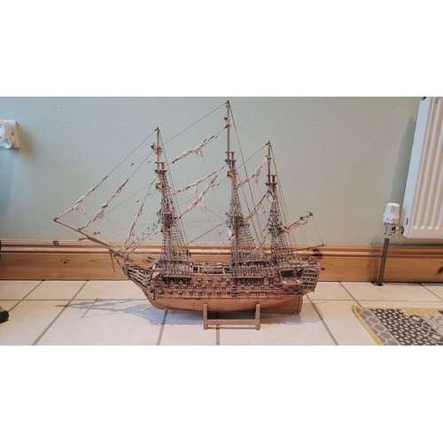 176 - A LARGE HANDMADE MODEL OF THE HMS VICTORY, made by a firm of model makers in Mauritius, Dimensions: ... 