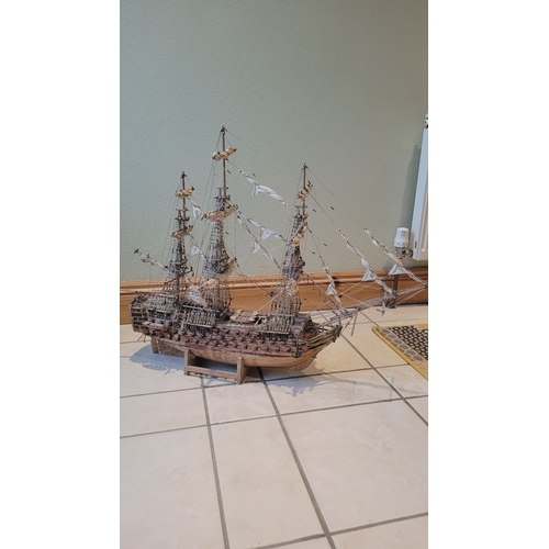 176 - A LARGE HANDMADE MODEL OF THE HMS VICTORY, made by a firm of model makers in Mauritius, Dimensions: ... 