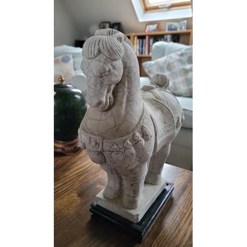 178 - A GOOD QUALITY 20TH CENTURY CARVED STONE ORNAMENT IN THE FORM OF A TANG STYLE HORSE, the horse comes... 