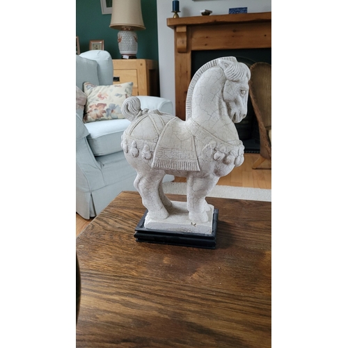 178 - A GOOD QUALITY 20TH CENTURY CARVED STONE ORNAMENT IN THE FORM OF A TANG STYLE HORSE, the horse comes... 