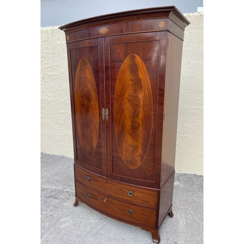 19 - AN EXCELLENT QUALITY MAHOGANY INLAID ROBERT STRAHAN DUBLIN WARDROBE, two door bow-fronted wardrobe, ... 