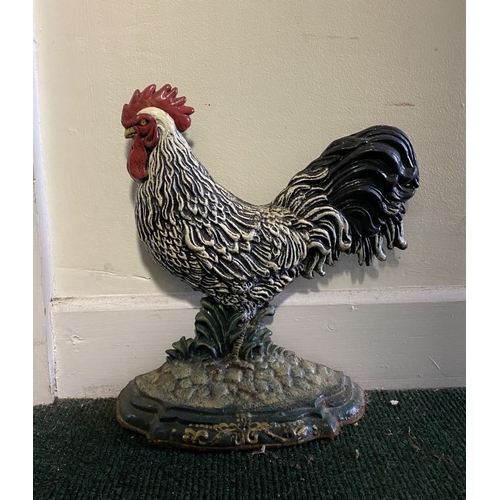 192 - A VINTAGE PAINTED CAST DOOR STOPPER, in the form of rooster, dimensions: 30.5cm high approx.