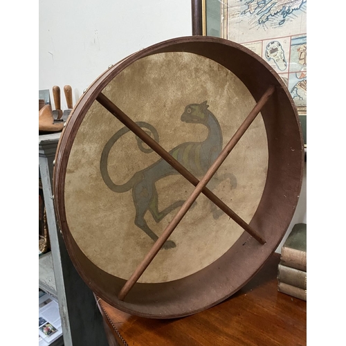 193 - TWO IRISH BODHRAN DRUMS, both with nice Celtic designs, dimensions: 45.5cm & 46.5cm diameter approx.