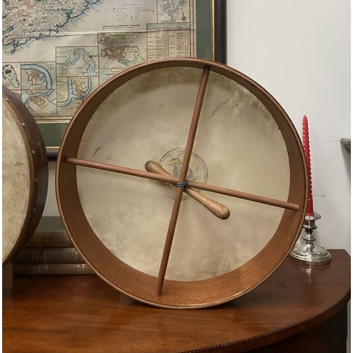 193 - TWO IRISH BODHRAN DRUMS, both with nice Celtic designs, dimensions: 45.5cm & 46.5cm diameter approx.