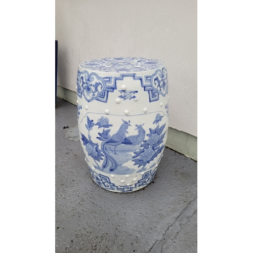 199 - TWO GOOD QUALITY BLUE & WHITE PIERCED CHINESE DRUM SEATS, decorated with dragons and floral decorati... 