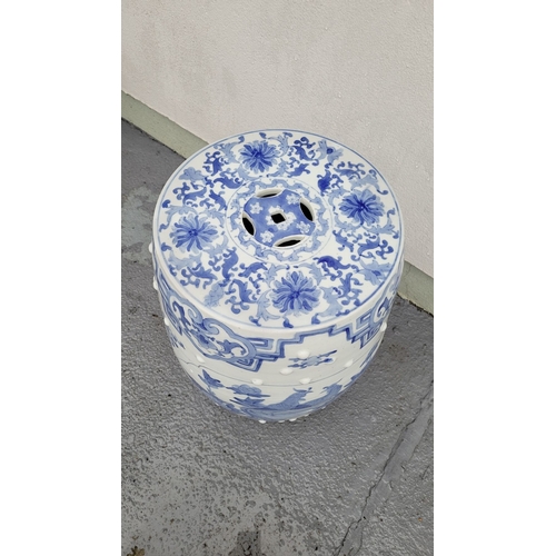 199 - TWO GOOD QUALITY BLUE & WHITE PIERCED CHINESE DRUM SEATS, decorated with dragons and floral decorati... 