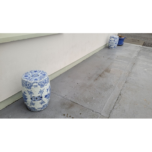 199 - TWO GOOD QUALITY BLUE & WHITE PIERCED CHINESE DRUM SEATS, decorated with dragons and floral decorati... 