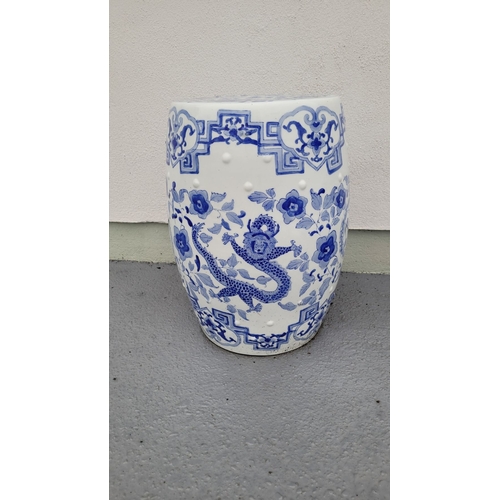 199 - TWO GOOD QUALITY BLUE & WHITE PIERCED CHINESE DRUM SEATS, decorated with dragons and floral decorati... 