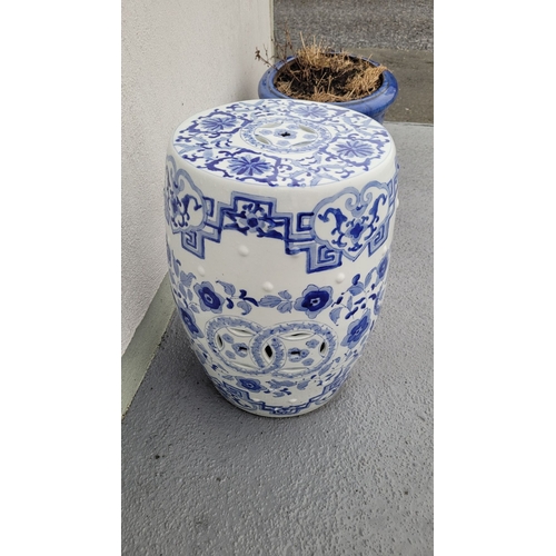 199 - TWO GOOD QUALITY BLUE & WHITE PIERCED CHINESE DRUM SEATS, decorated with dragons and floral decorati... 