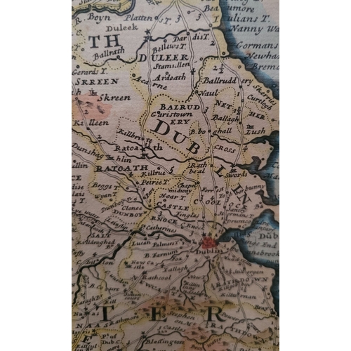 21 - A FRAMED RARE MAP OF IRELAND: 18TH CENTURY: hand coloured example of Herman Moll’s 1714 map of the i... 