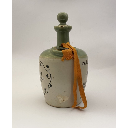 222 - A VINTAGE STONEWARE TULLAMORE DEW DECANTER, with wax seal to top embossed 1791, the front reading ‘T... 