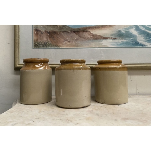 225 - THREE VINTAGE TWO-TONE GLAZED STONEWARE JARS, one by Skey Tamworth, all with two tone glazed design.... 