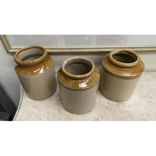 225 - THREE VINTAGE TWO-TONE GLAZED STONEWARE JARS, one by Skey Tamworth, all with two tone glazed design.... 