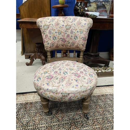 231 - A CHARMING WELSH LOW RISE NURSING CHAIR, with circular cushioned seat, curved headrest supported on ... 