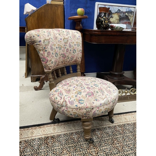 231 - A CHARMING WELSH LOW RISE NURSING CHAIR, with circular cushioned seat, curved headrest supported on ... 