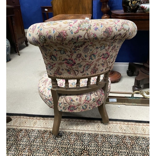 231 - A CHARMING WELSH LOW RISE NURSING CHAIR, with circular cushioned seat, curved headrest supported on ... 