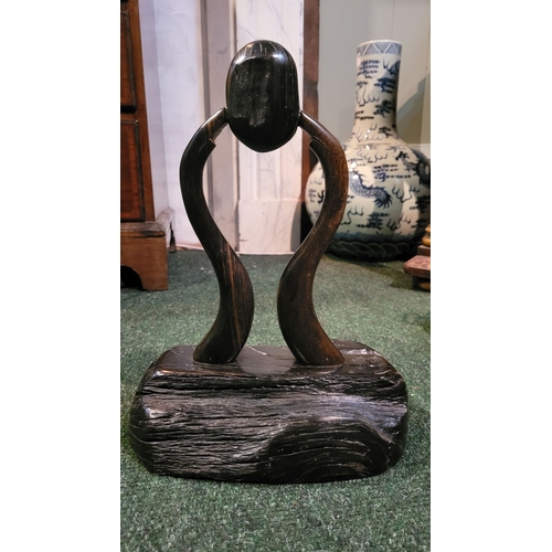 241 - A BOG OAK & TIMBER SCULPTURE, hand crafted, dimensions: 37cm high x 27cm wide x 14cm deep approx.