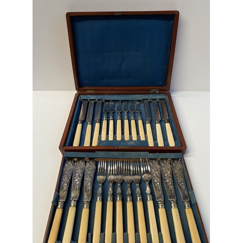 247 - A VINTAGE HARDWOOD CASED CUTLERY SET, interior with removable compartment, top compartment has six f... 