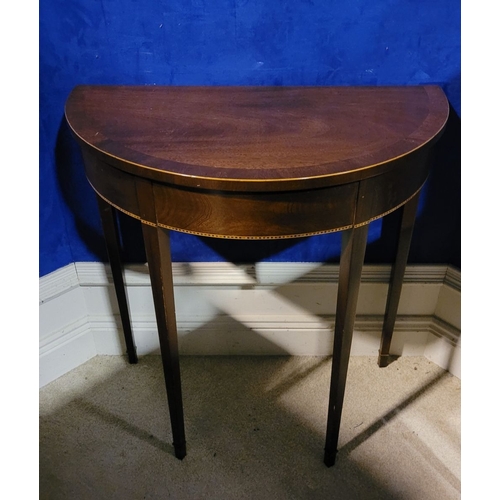 25 - A VERY FINE NEATLY SIZED 19TH CENTURY MAHOGANY & SATINWOOD INLAID DEMI-LUNE TABLE, very well constru... 