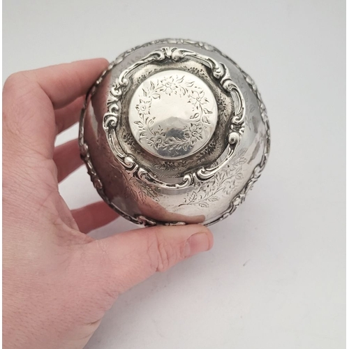 35 - A LOVELY EARLY 20TH CENTURY SILVER TOPPED CUT GLASS SCENT BOTTLE, the lid, and shoulders capped with... 