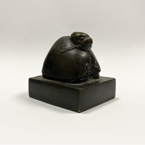 4 - A SUBSTANTIAL QING DYNASTY CHINESE BRONZE SEAL, the seal surmounted by Chinese mythical creature, po... 