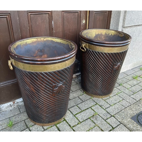 41 - A PAIR OF IRISH MAHOGANY BRASS BOUND PEAT BUCKETS, both of traditional form with carved fluted borde... 