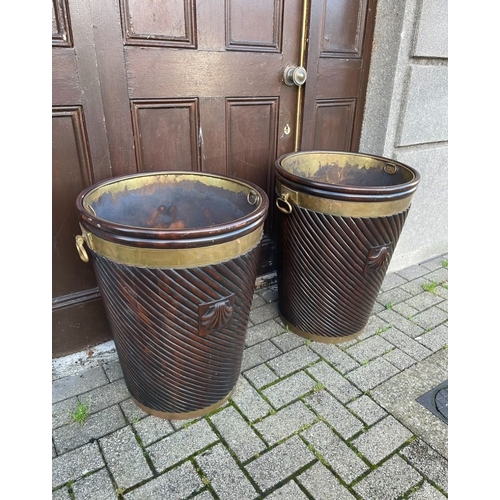 41 - A PAIR OF IRISH MAHOGANY BRASS BOUND PEAT BUCKETS, both of traditional form with carved fluted borde... 