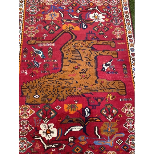 58 - AN EXCELLENT MID CENTURY HANDMADE IRANIAN GABBEH RUG, vibrant hand knotted rug featuring pictural de... 