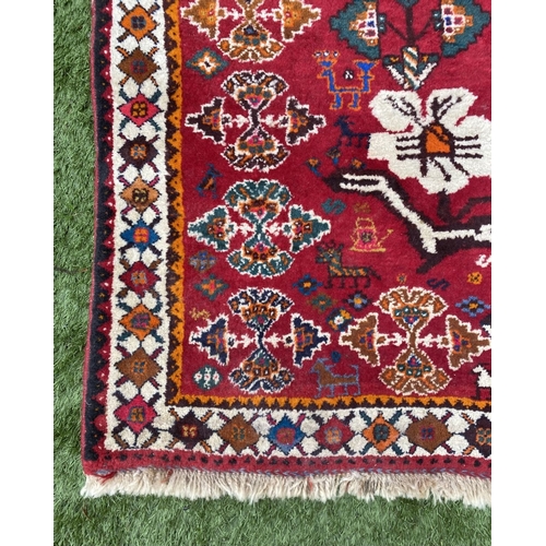 58 - AN EXCELLENT MID CENTURY HANDMADE IRANIAN GABBEH RUG, vibrant hand knotted rug featuring pictural de... 