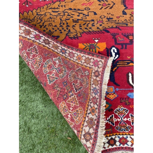 58 - AN EXCELLENT MID CENTURY HANDMADE IRANIAN GABBEH RUG, vibrant hand knotted rug featuring pictural de... 