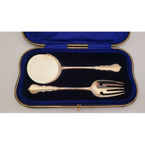 59 - AN UNUSUAL CASED EGG & BACON SERVER SET, in an original fitted case with blue silver & velvet lining... 