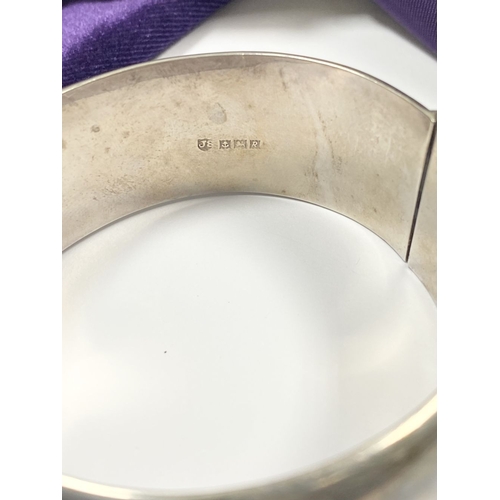 67 - AN ENGRAVED SILVER BANGLE BRACELET, Hallmarked Joseph Smith & Sons (Birmingham) Ltd, Vittoria Street... 