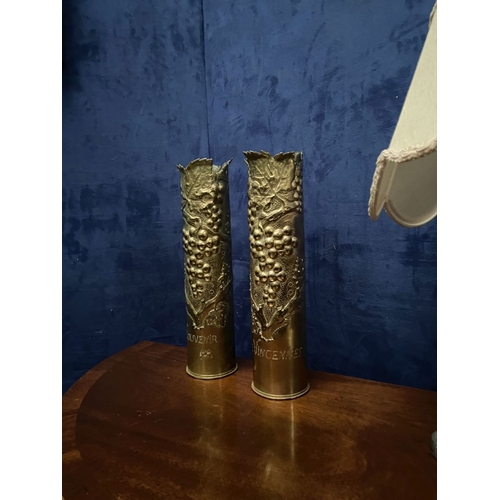 84 - A PAIR OF LARGE DECORATIVE TRENCH ART SHELL CASES, 75mm, both decorated with embossed and engraved g... 