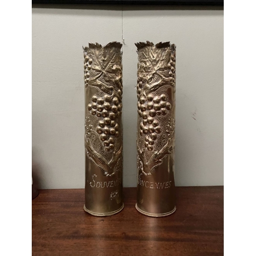 84 - A PAIR OF LARGE DECORATIVE TRENCH ART SHELL CASES, 75mm, both decorated with embossed and engraved g... 