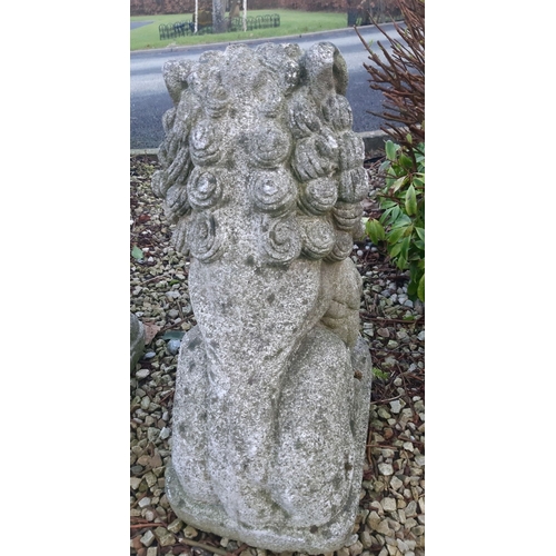 92 - A LARGE PAIR OF COMPOSITE GARDEN ORNAMENTS, in the form of Foo Dogs, detailed and very heavy, wear a... 