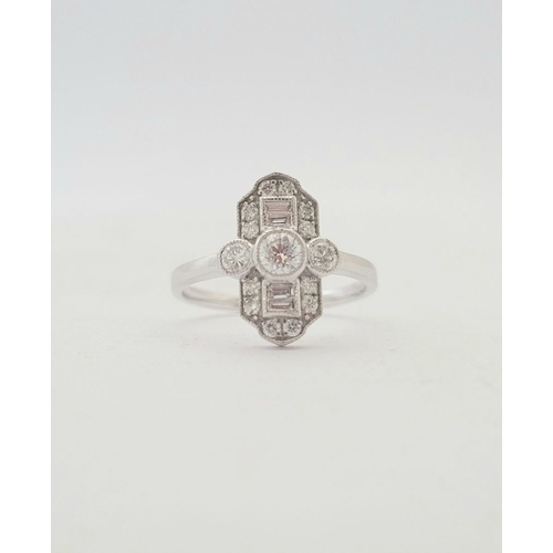 13 - AN ART DECO INSPIRED DIAMOND RING, in the classical Art Deco design with a mix of baguette and round... 