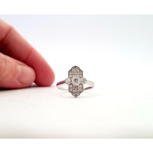 13 - AN ART DECO INSPIRED DIAMOND RING, in the classical Art Deco design with a mix of baguette and round... 